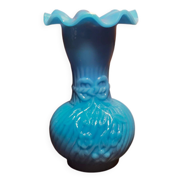 Blue opaline vase, opaque glass, wavy neck/rim, relief decoration of a bow.