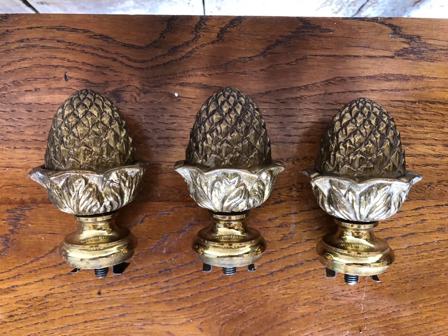 Set of 3 pine cones curtain rod golden bronze