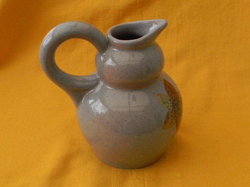 Ceramic pitcher by simone larrieu.