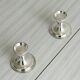 Pair of lightweight silver metal candlesticks