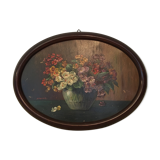 Still life bouquet of priming oval frame