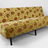 Bench with yellow and red floral fabric, France, circa 1960