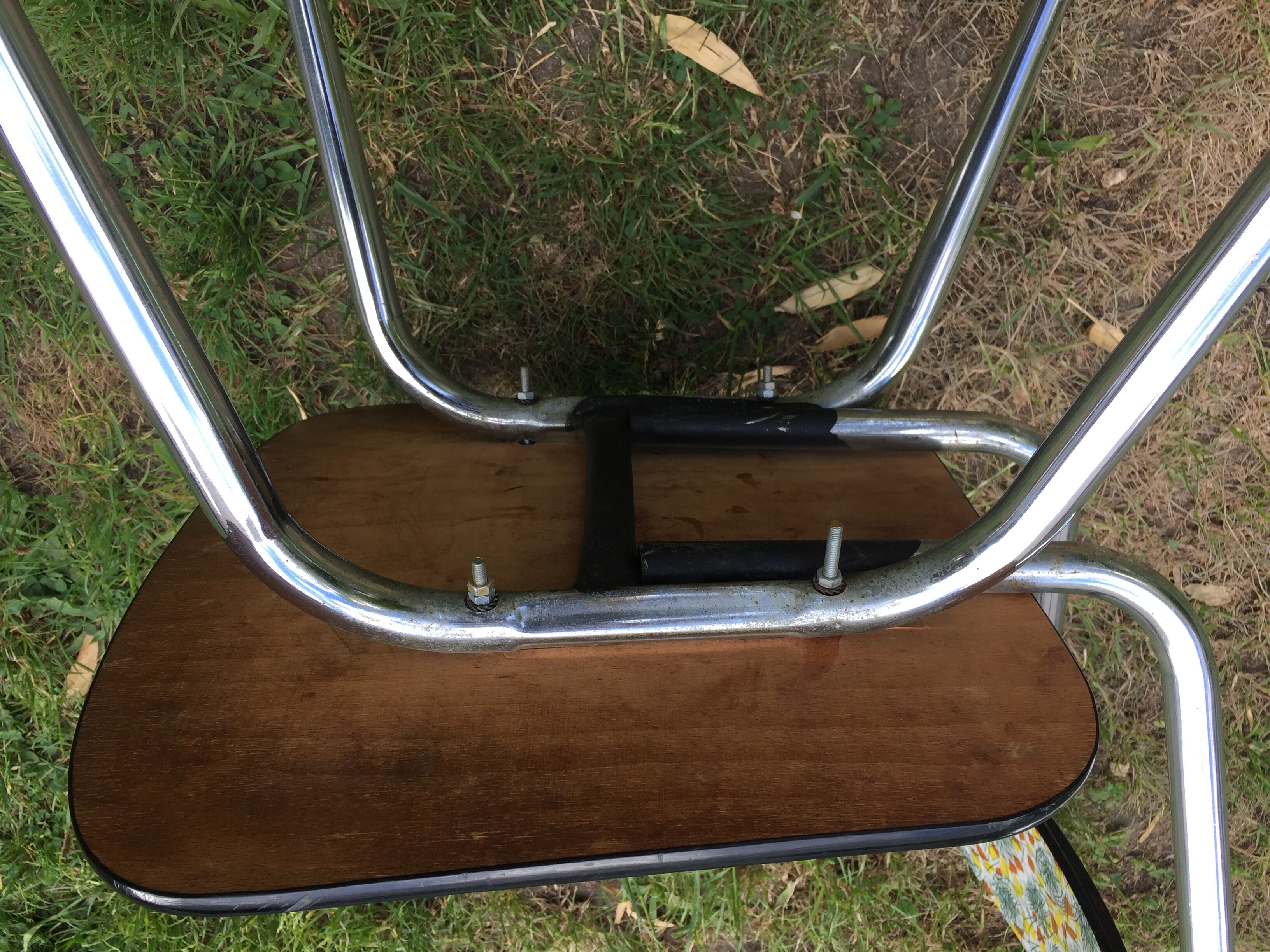 Duo of chairs formica patterns flowers graffiti