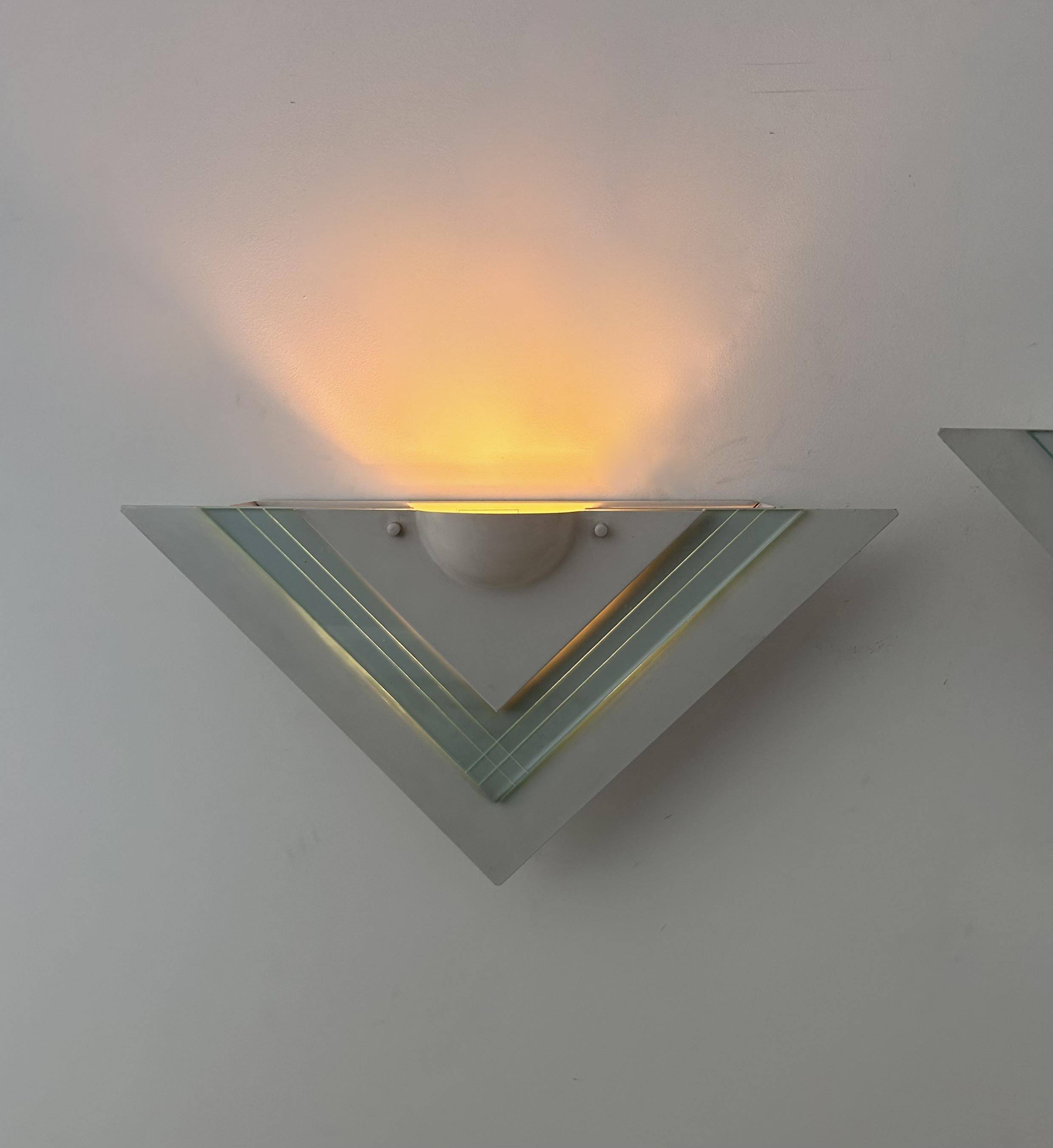 Pair of vintage wall lights, white lacquered metal and glass, Germany 1970s