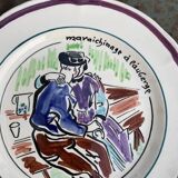 Collectible plate painted by Henry Simon, market gardening at the inn, in enameled ceramic,