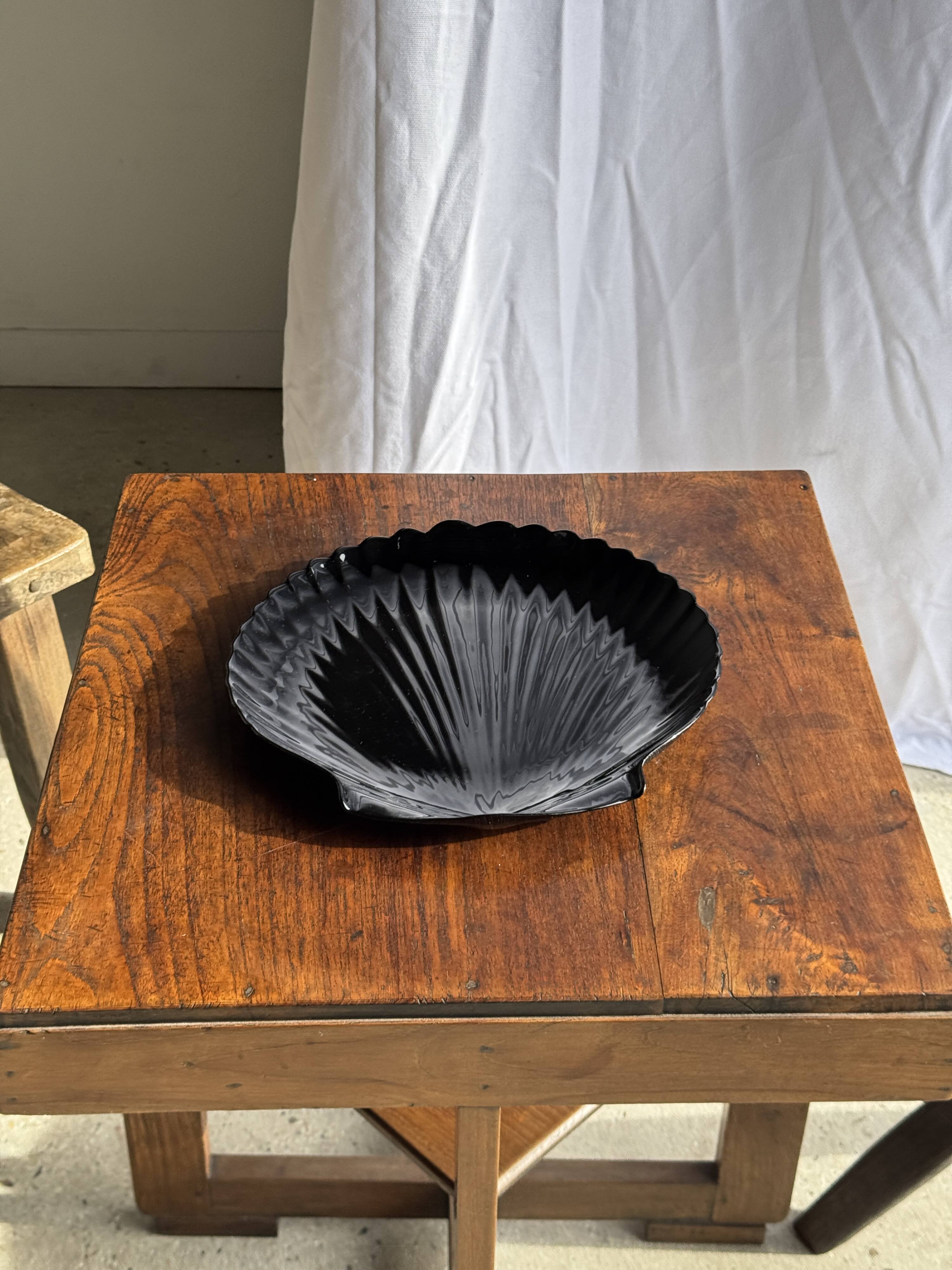 Pair of vintage black glass shell dishes D32 and D26