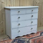 English chest of drawers painted in fir with glass knobs, 19th century