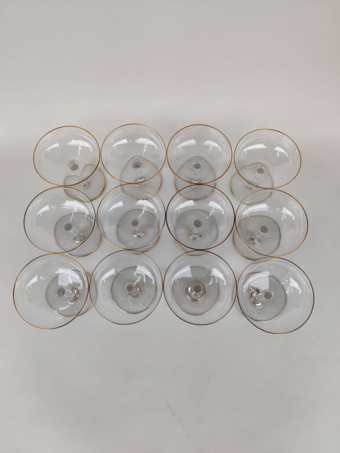 12 Baccarat crystal champagne coupes, circa 1900.