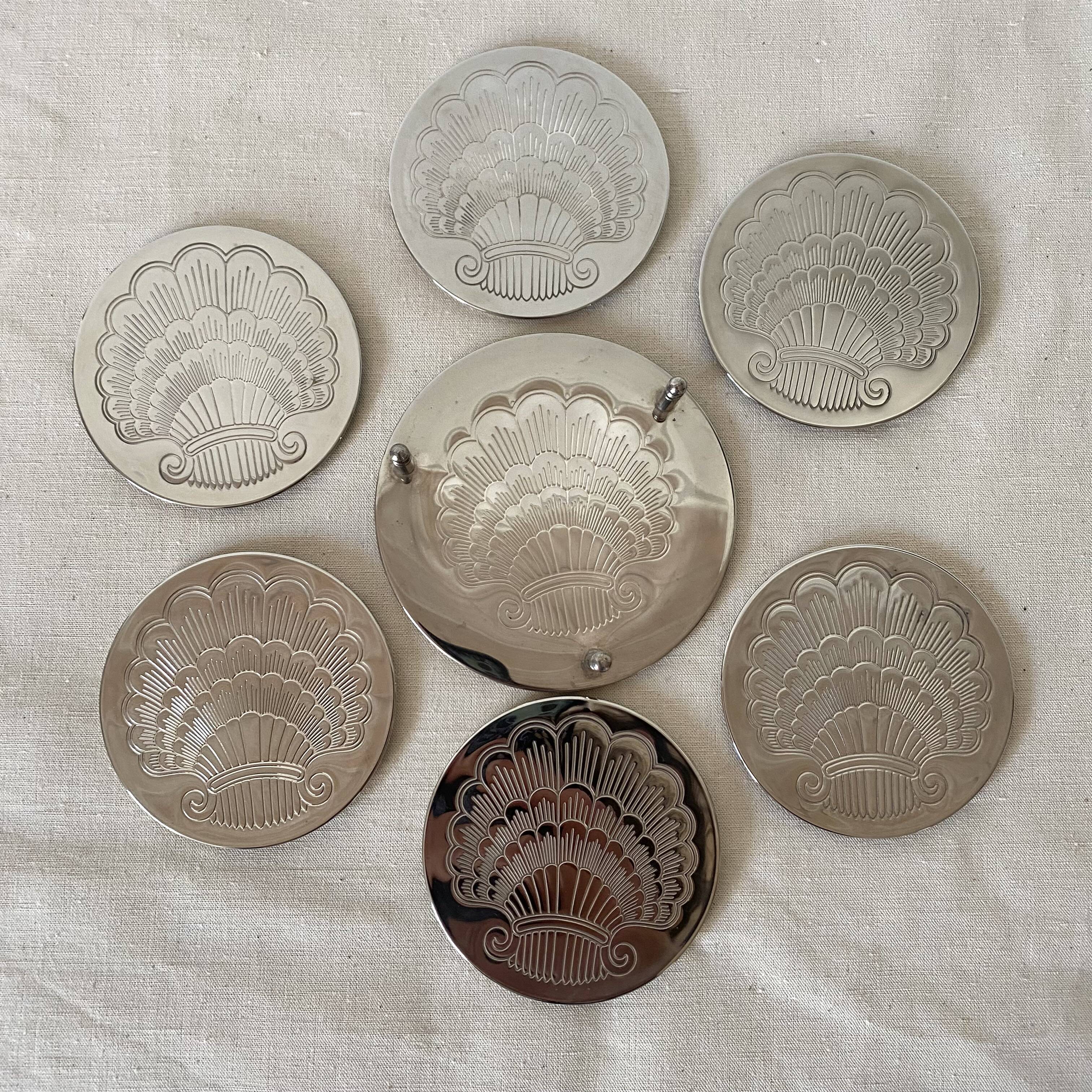 Silver coaster and holder, shell, 80s