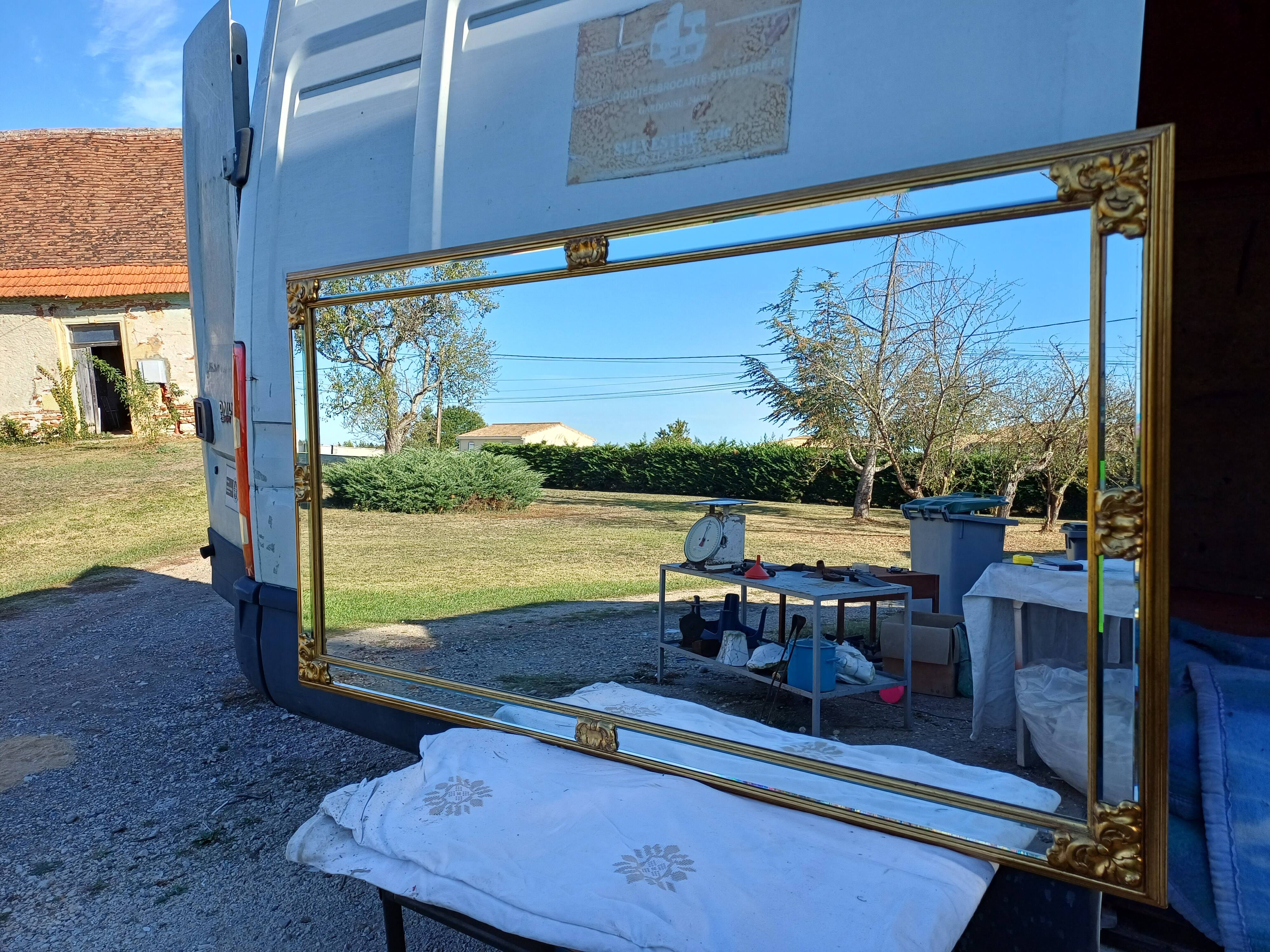 Pareclose and Beveled Wood and Golden Stuk Mirror