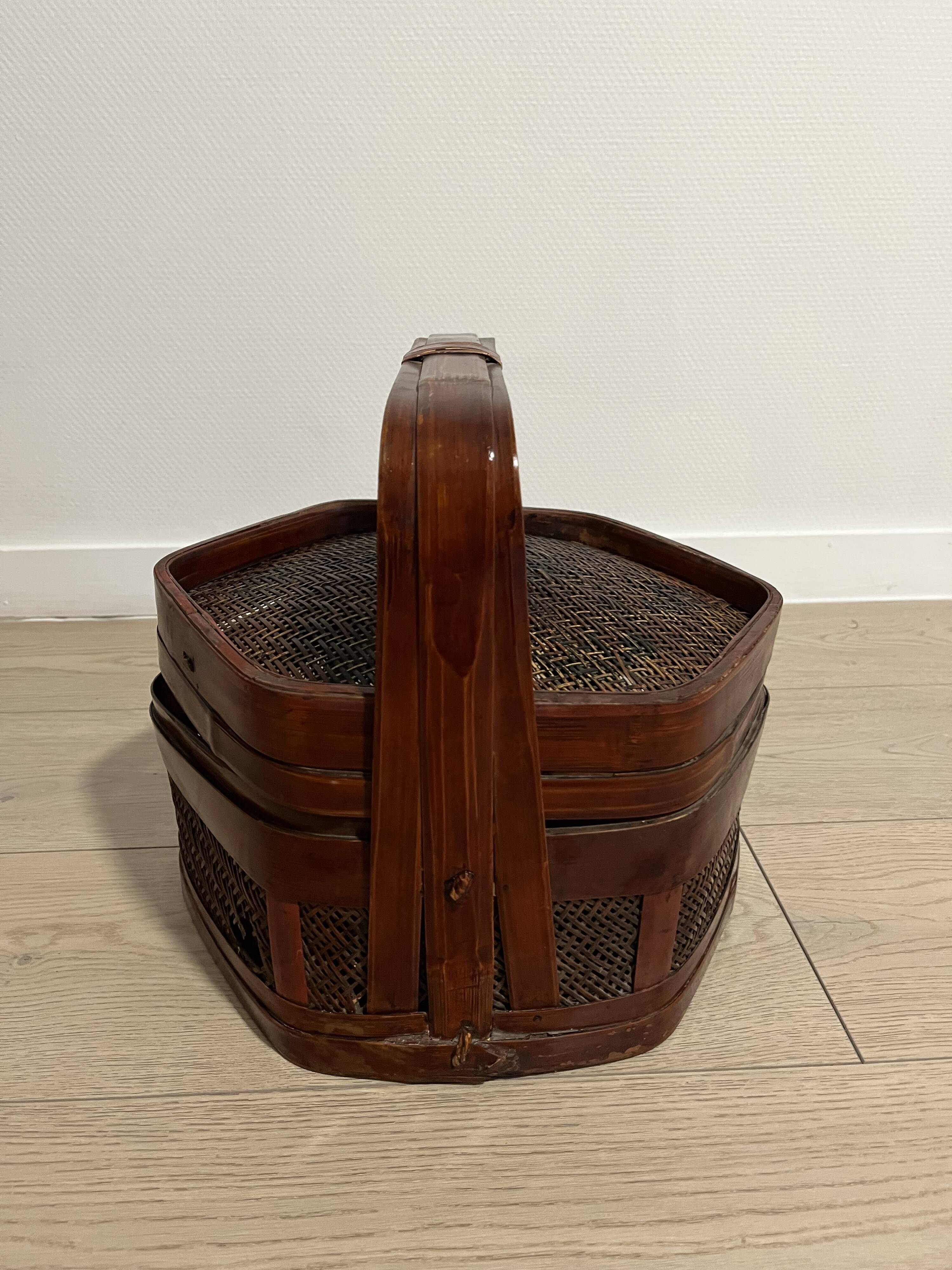 Ancient wooden and woven wicker basket,