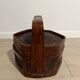 Ancient wooden and woven wicker basket,