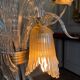 Asymmetrical Venetian chandelier in colourless and gold Murano glass, circa 1980.
