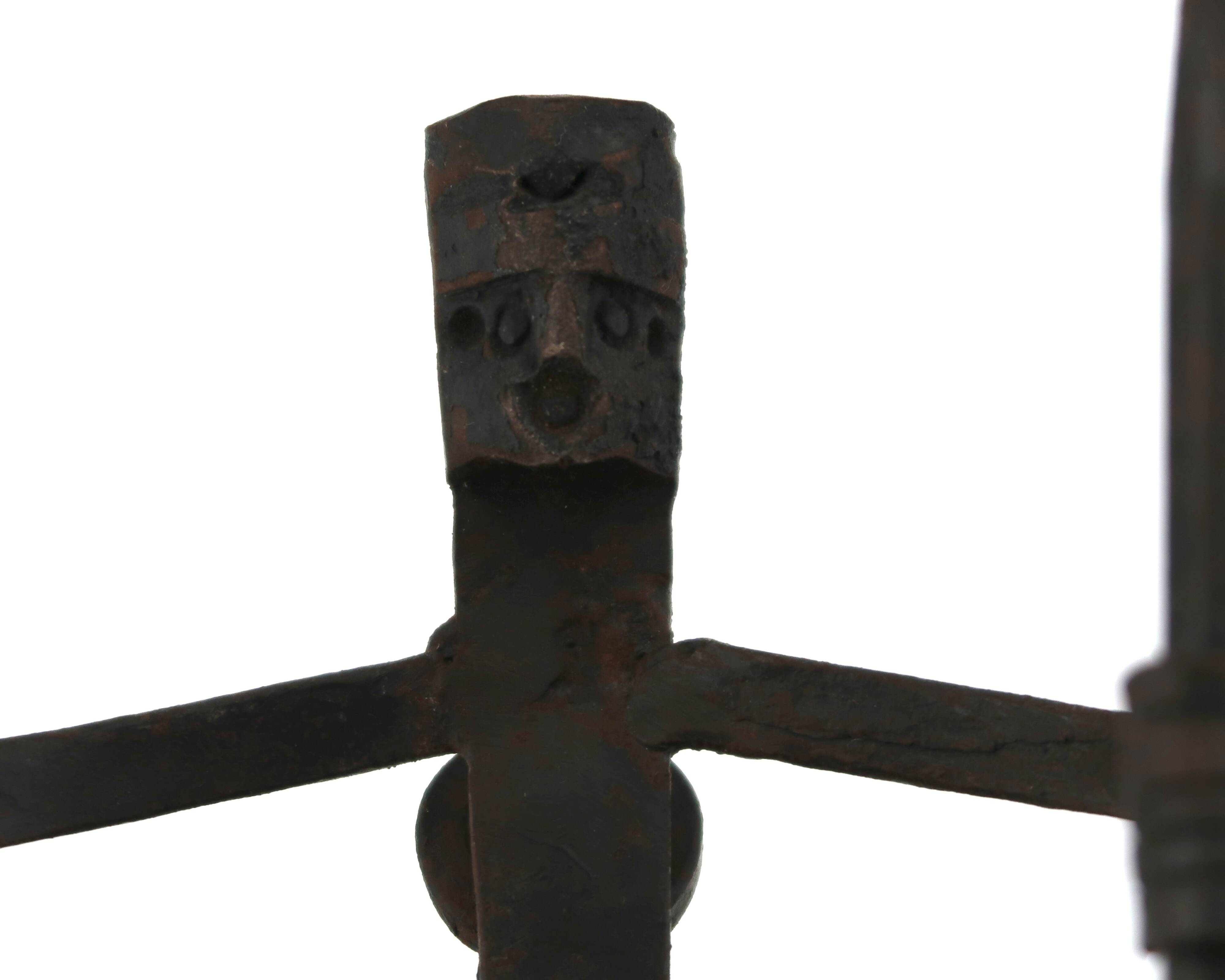 Anthropomorphic wall candle holder in wrought iron, 1950s.