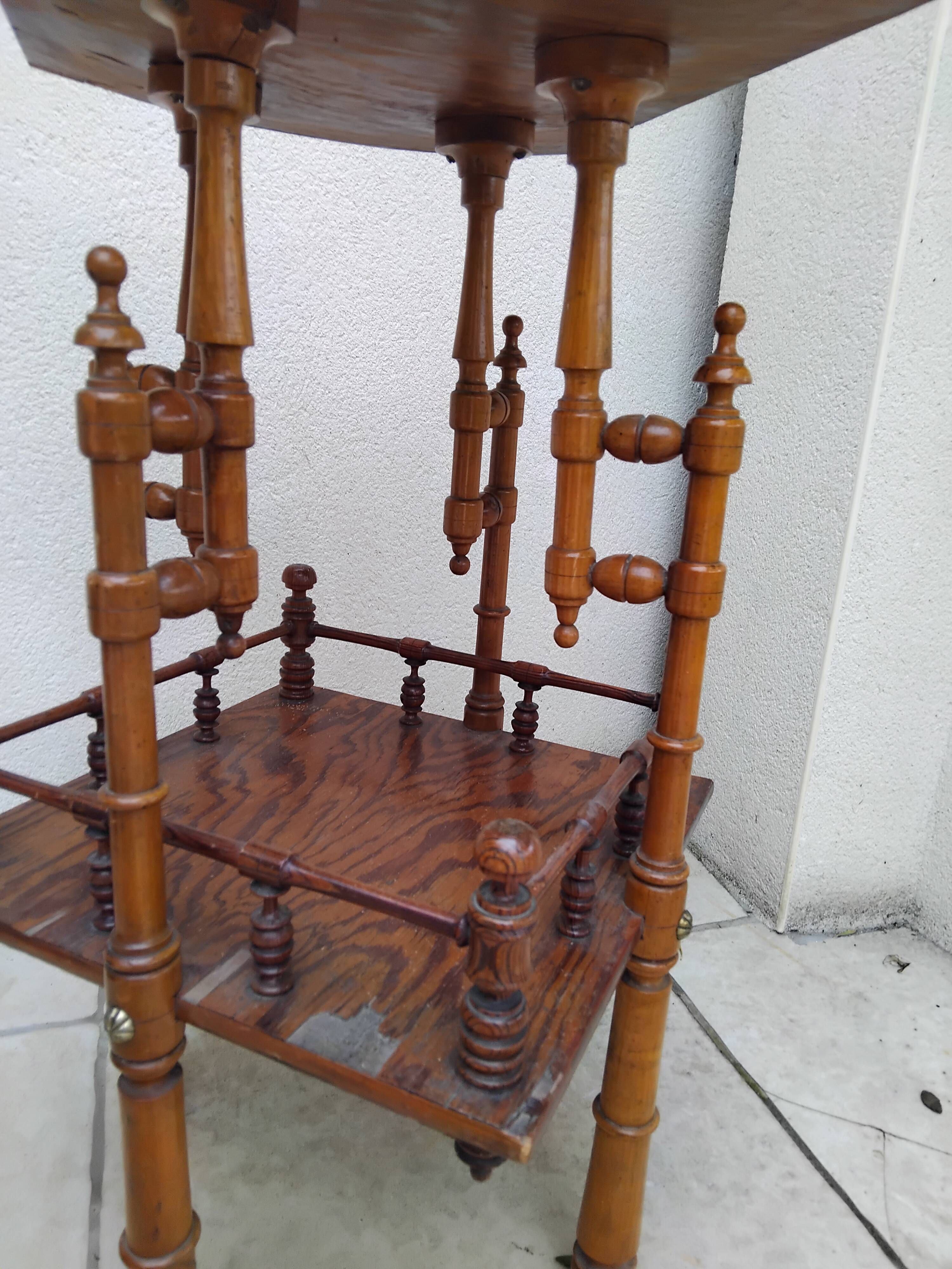 Antique pedestal table in Asian Japonese style.