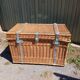 Antique wicker travel trunk