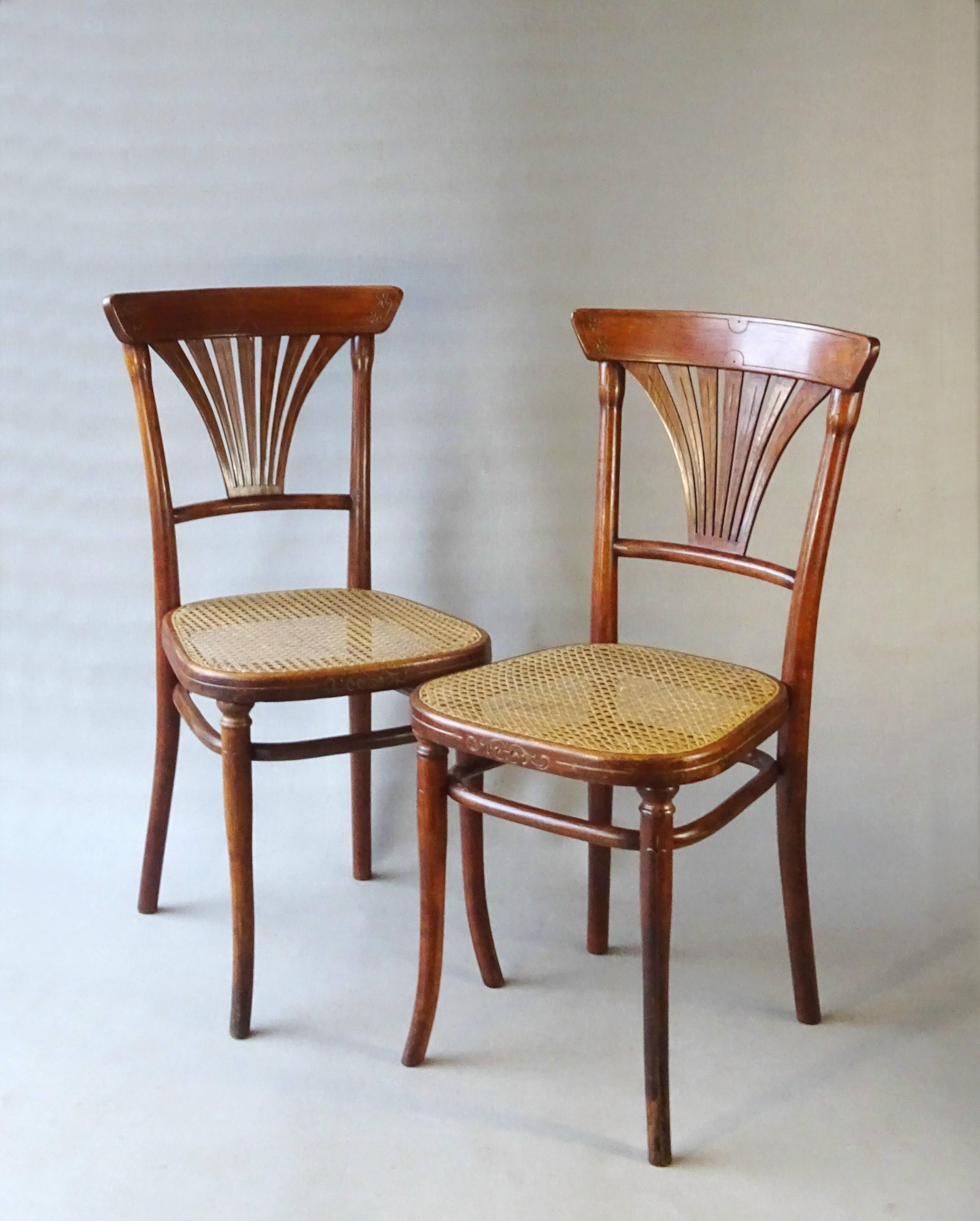 2 Thonet N°221 chairs, caned Art Nouveau bronze decor