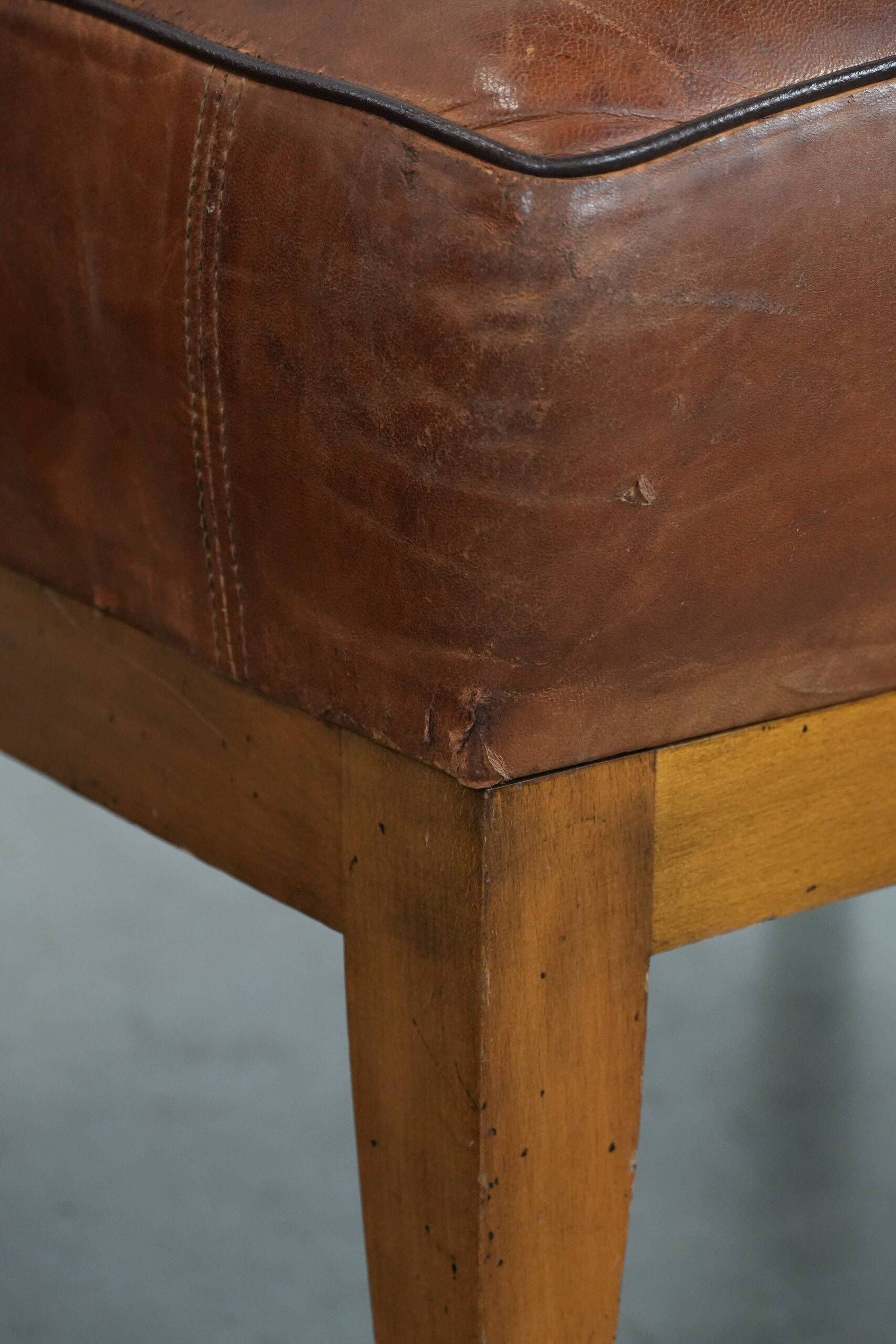 Set of 4 vintage design chairs made of sheepskin leather