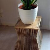 Tabouret coffre en teck naturel brun et noir.