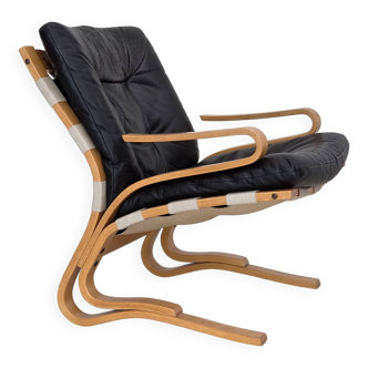 1970s, Norwegian design, armchair model "Kengu", leather, bent wood.