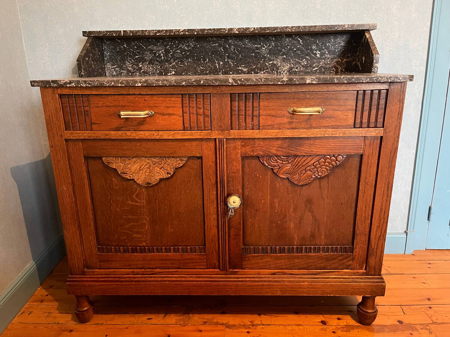 Wooden sideboard with marble top