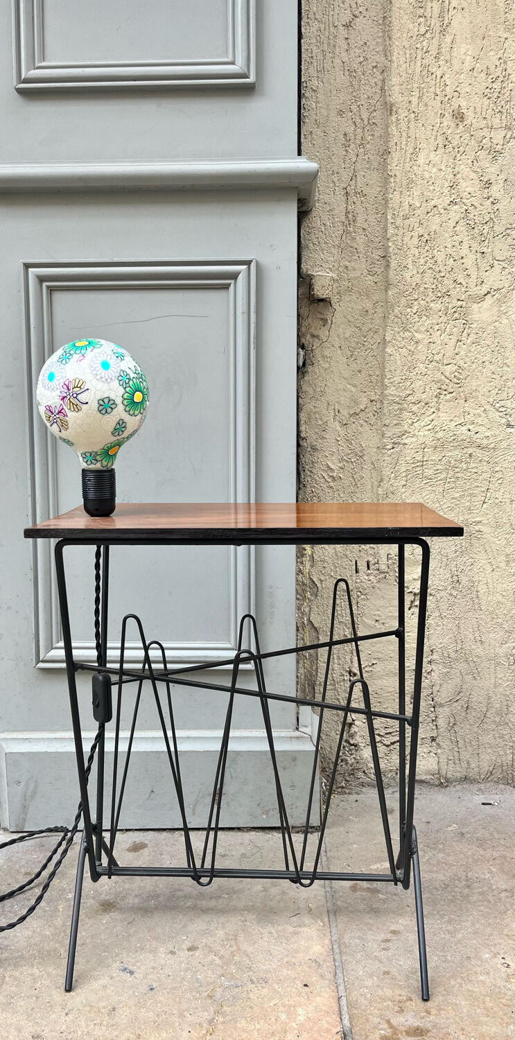Newspaper holder with bulb