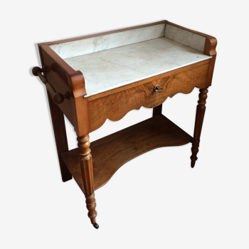 Old walnut dressing table with its toiletries