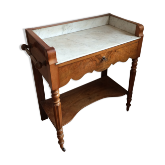 Old walnut dressing table with its toiletries