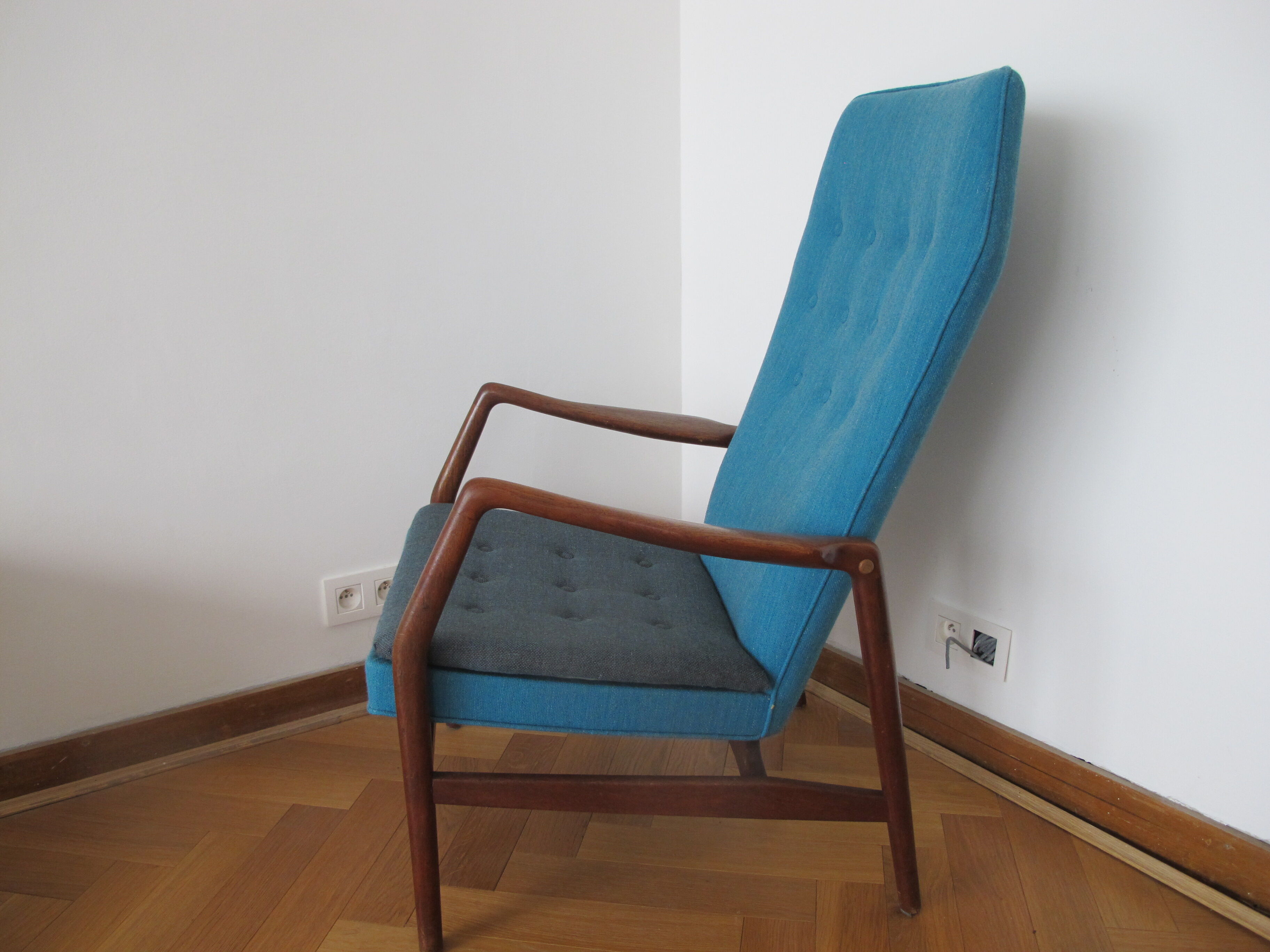 Tall back chair by Kurt Olsen