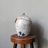 Handmade raku ceramic pot in contemporary Japandi design.