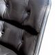 Charles Pollock Knoll office chair in black leather without armrests.