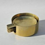 4 brass ashtrays in their 1970 case