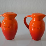 Le Creuset orange advertising salt and pepper
