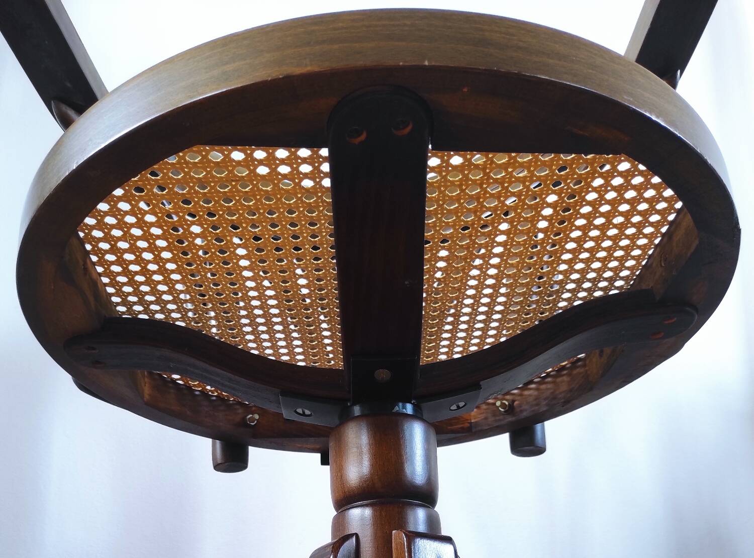 Vintage swivel office chair with curved wood and caning (Thonet style)