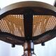 Vintage swivel office chair with curved wood and caning (Thonet style)