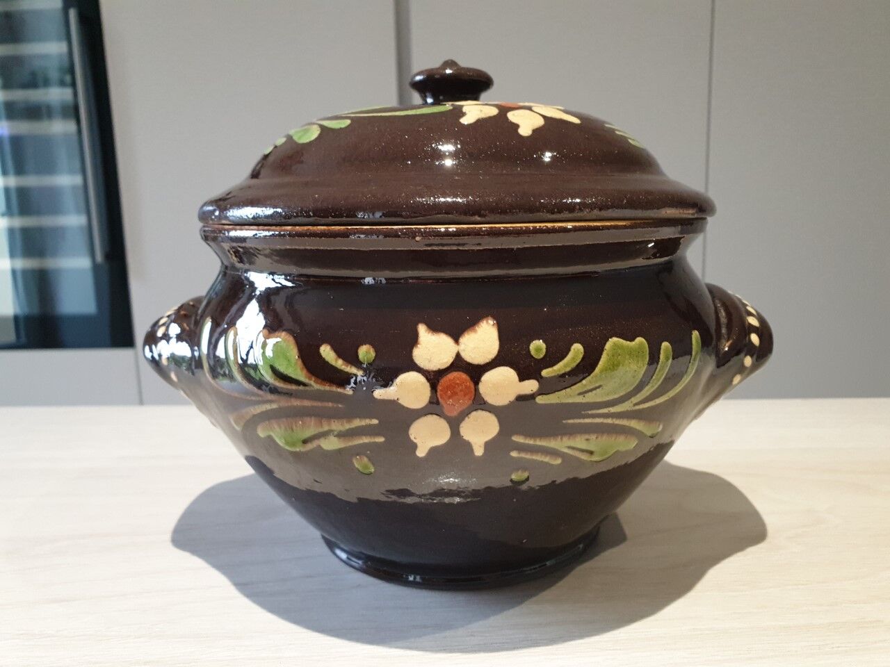 Large glazed terracotta covered pot