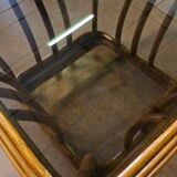 Rattan and smoked glass coffee table, vintage 1970s design.