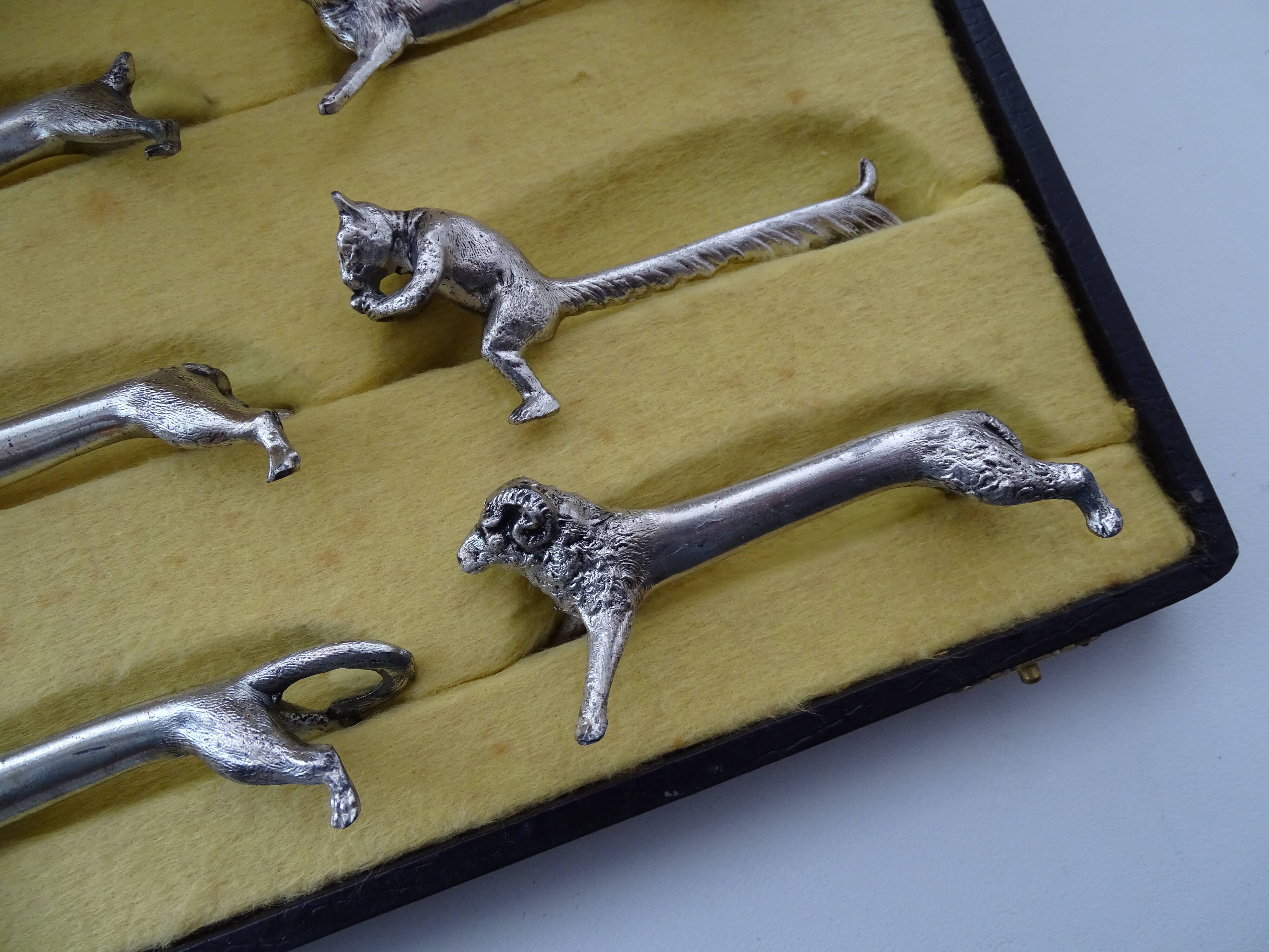 12 animal knife holders Art Deco antique silver metal in case