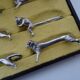 12 animal knife holders Art Deco antique silver metal in case