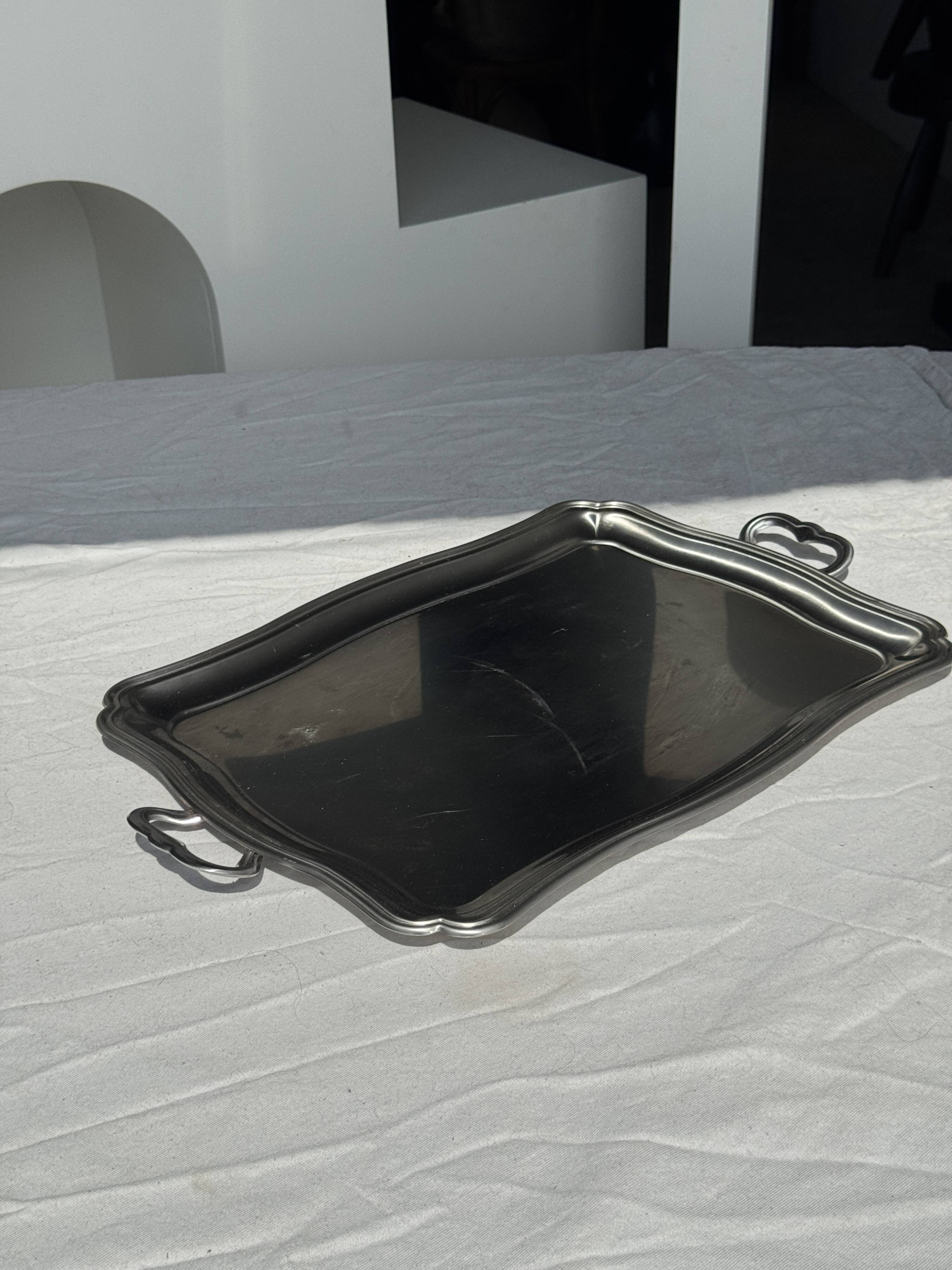 Guy Degrenne silver stainless steel serving tray with an eventful shape