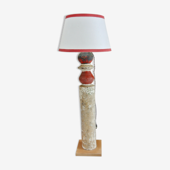 Red and white patinated wooden lamp