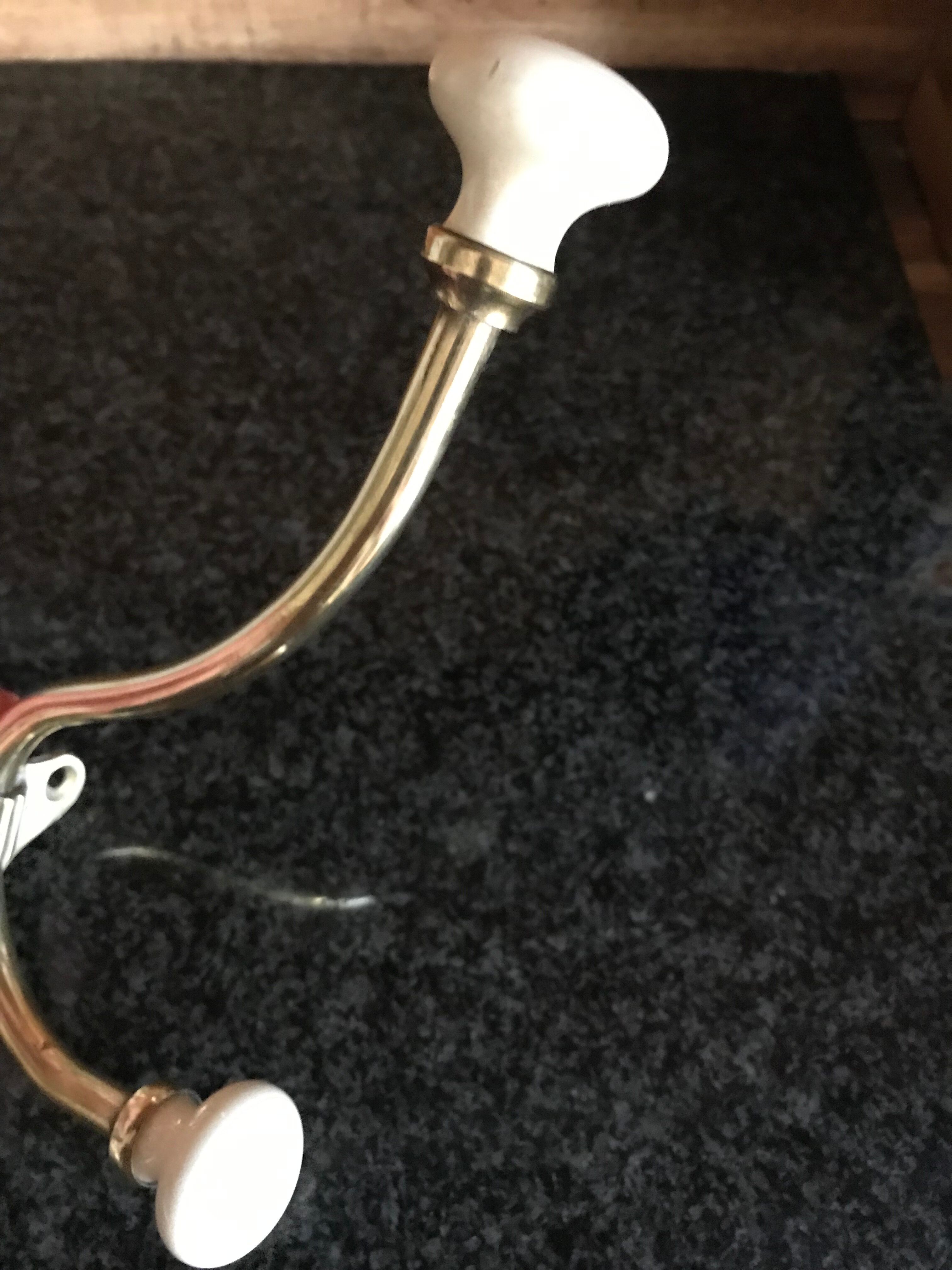 Brass and porcelain hook