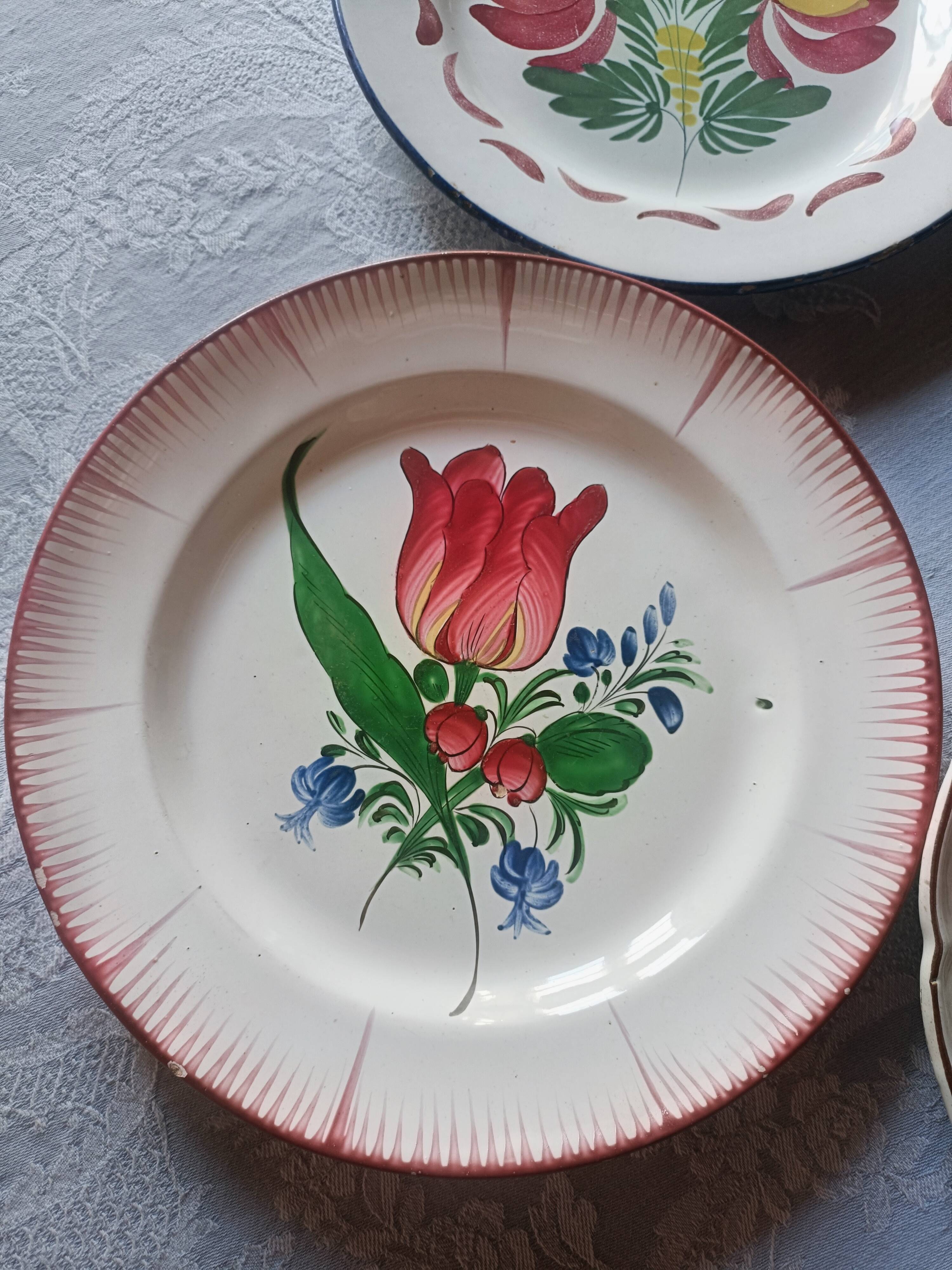 Set of 4 19th-century earthenware plates.