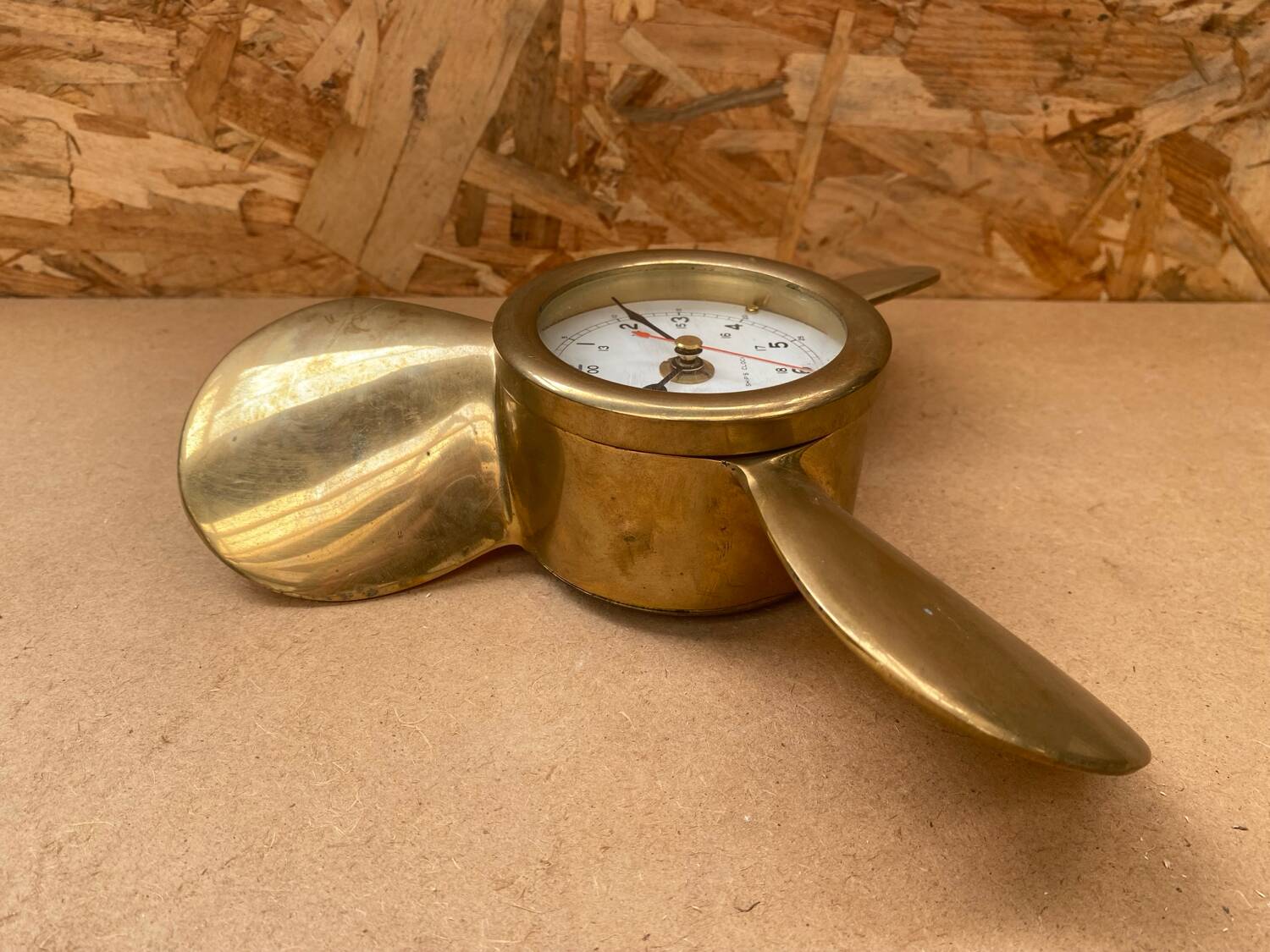 Antique brass propeller with pendulum vintage nautical wall clock