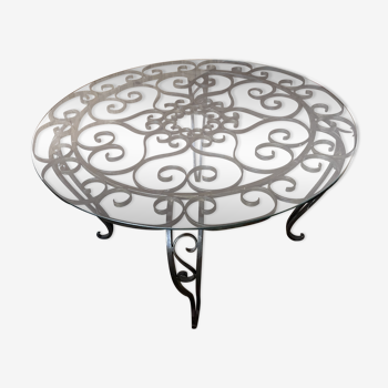 Round black wrought iron and glass coffee table