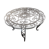 Round black wrought iron and glass coffee table