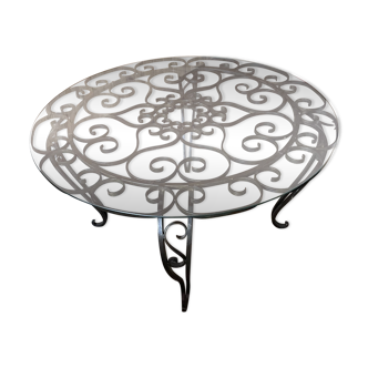 Round black wrought iron and glass coffee table