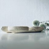 Travertine fish pocket emptier