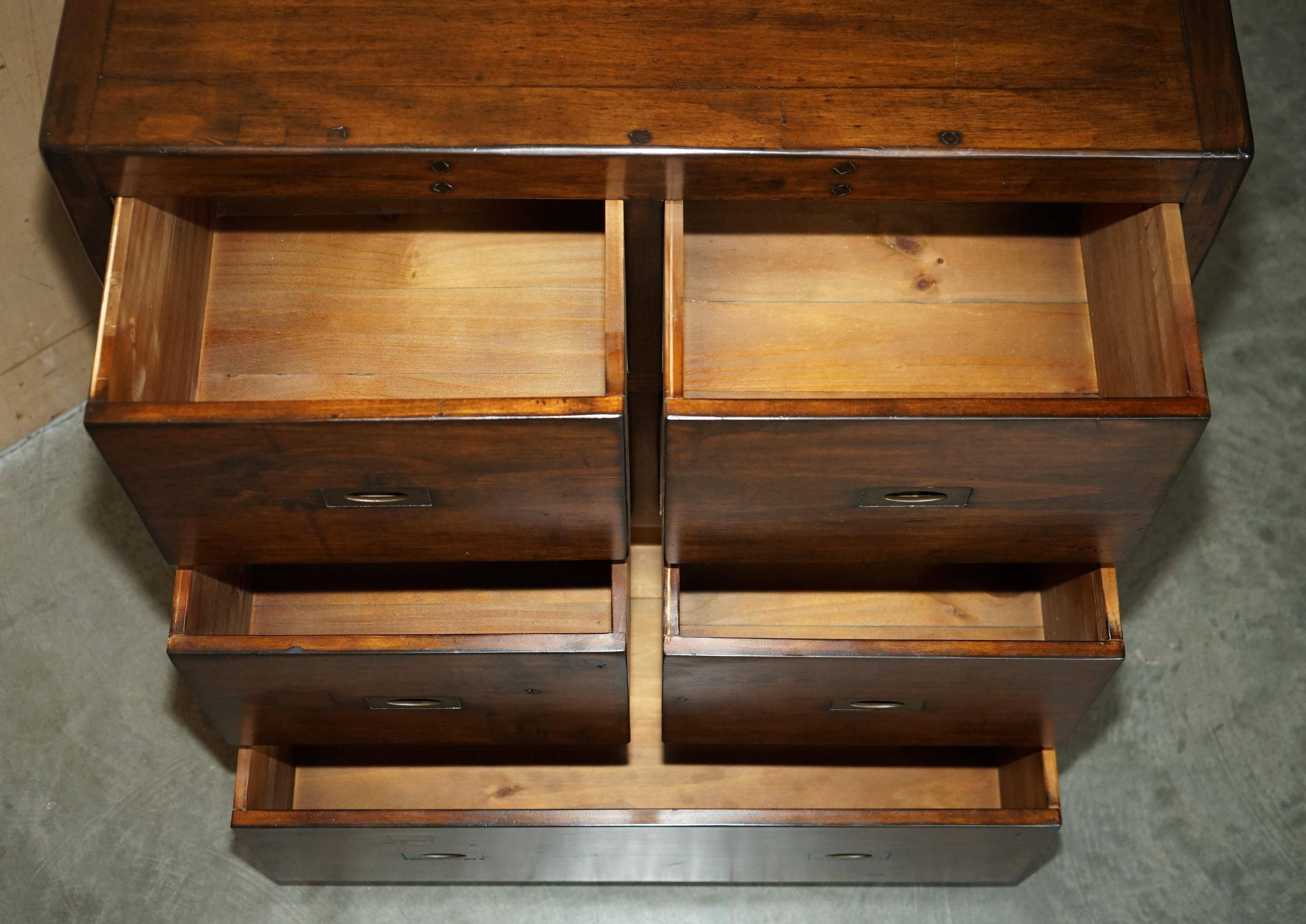 Large vintage hardwood furniture in military country style.