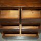 Large vintage hardwood furniture in military country style.